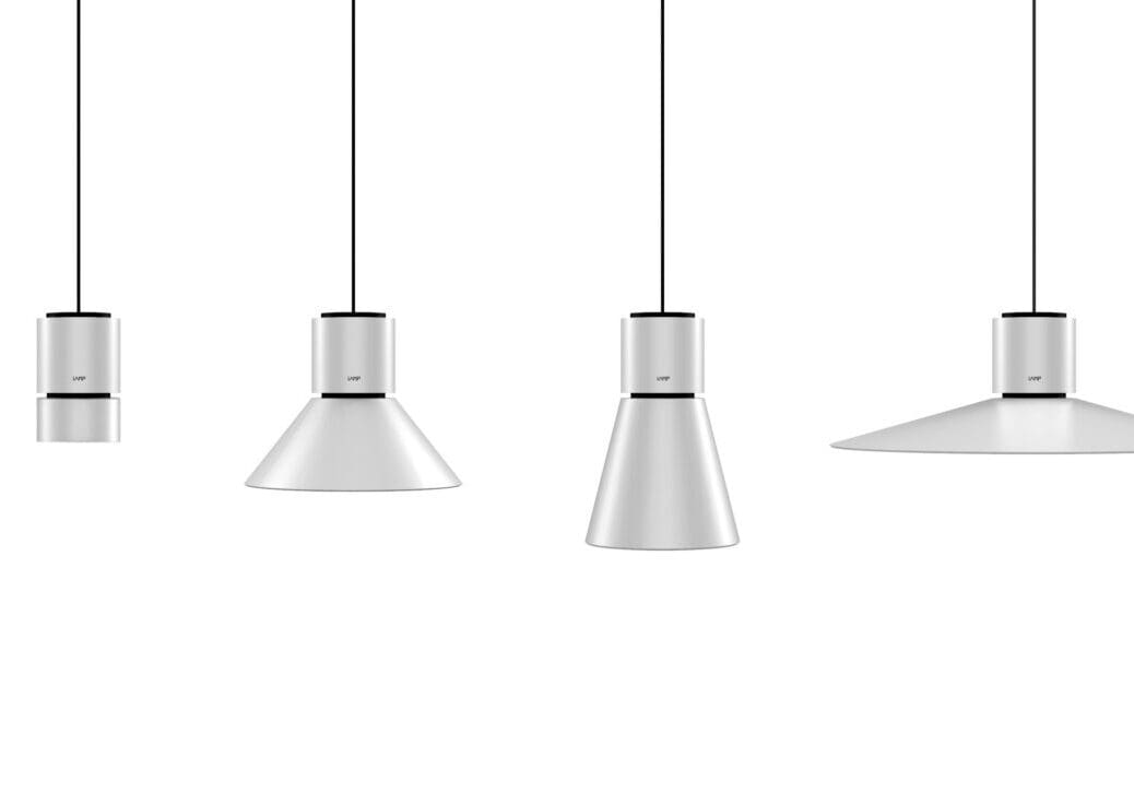 Two modern pendant lights with clear glass shades hanging from cords.