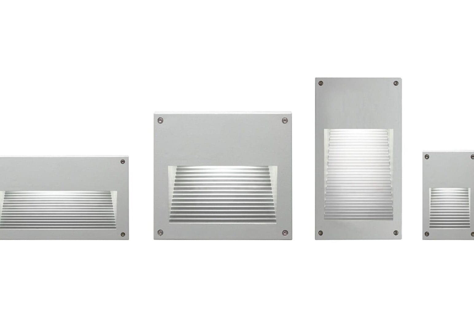 A group of three different sized lights on top of each other.