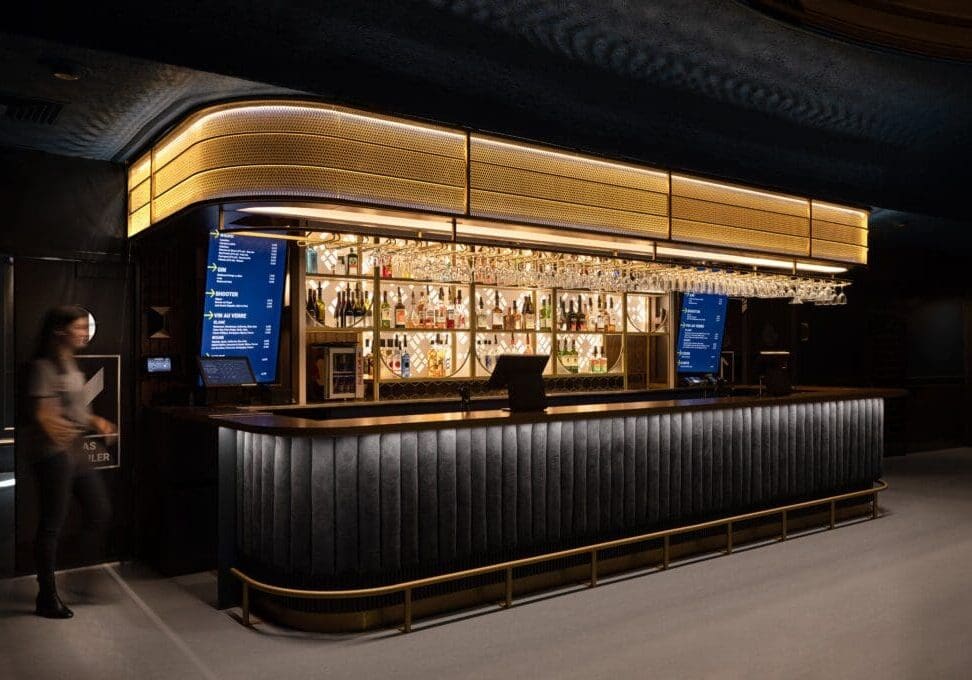 Elegant modern bar with warm lighting and sleek design.