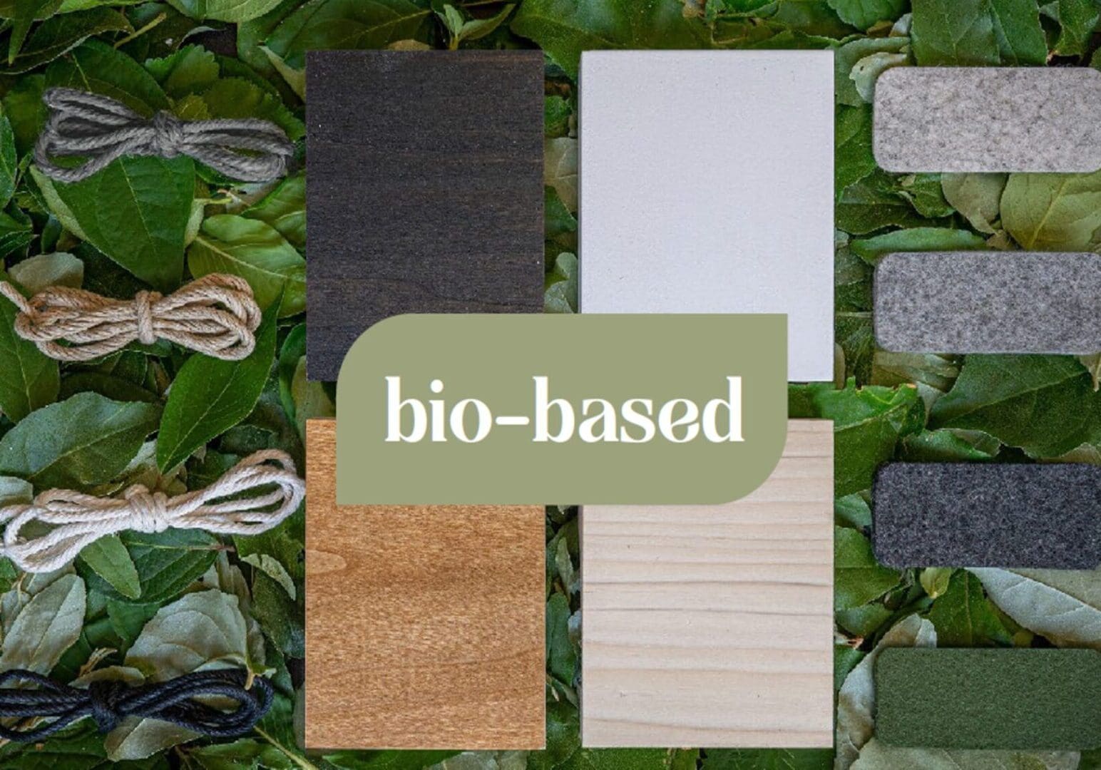 A bunch of different colored wood and paper on some grass