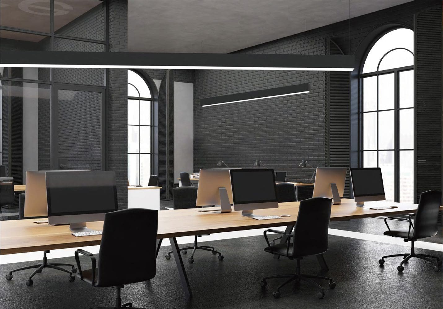 Modern office with sleek desks and chairs in a spacious, well-lit room.